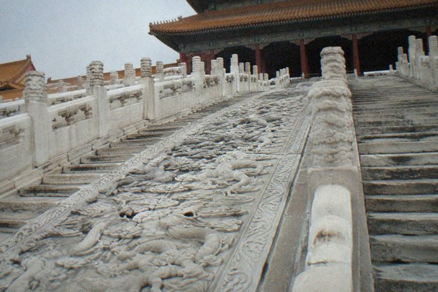 The Hall of Supreme Harmony courtyard with its white marble staircase in morning light